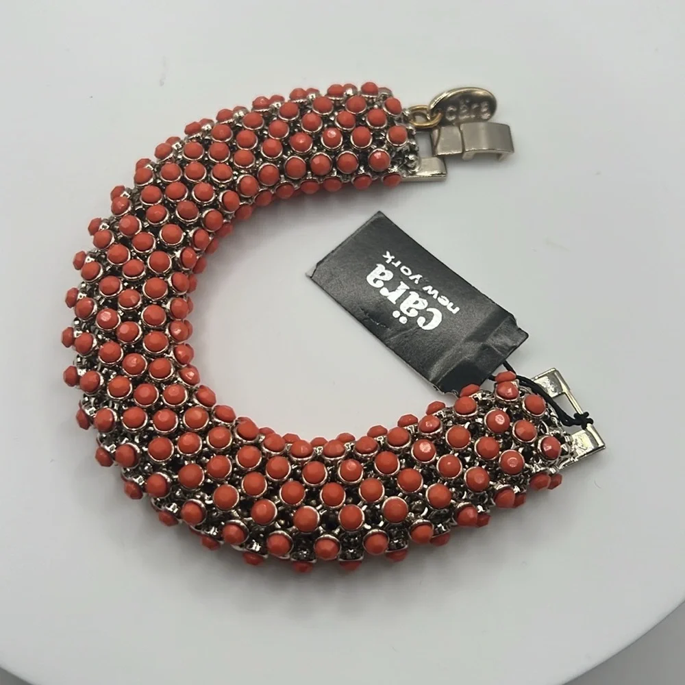 1346.‎ Cara New York Gold and Orange Fold over Closure Bracelet